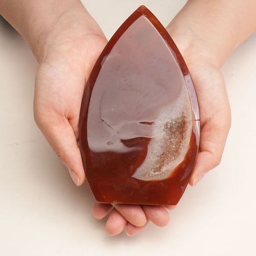 Polished Carnelian crystal promotes vitality and motivation