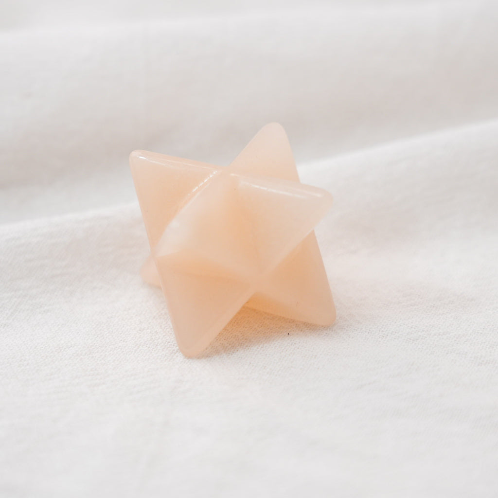 Hand-carved Pink Aventurine Merkaba, a powerful symbol of protection and energy