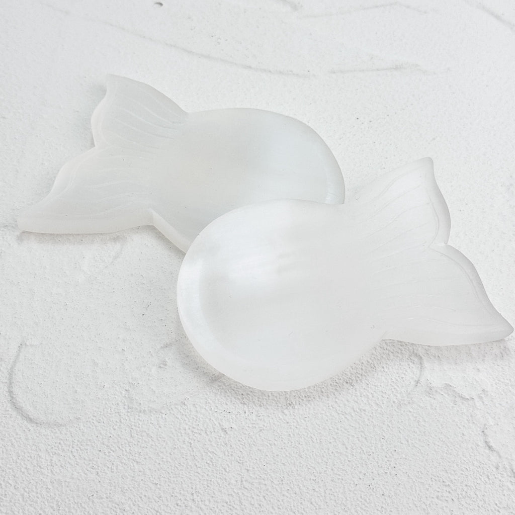 Selenite Fishbowl Carving acting as a purifying station for crystals