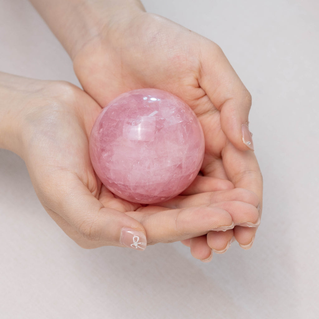 Hand-polished Rose Quartz Sphere for heart chakra and compassion